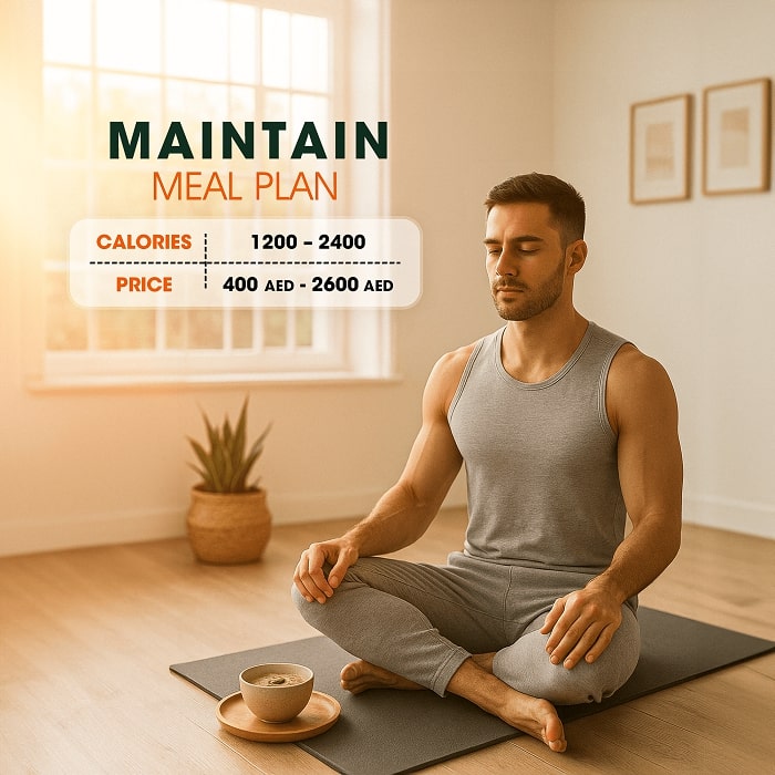 man holding an apple since he maintained healthy weight via weight maintenance meal plans